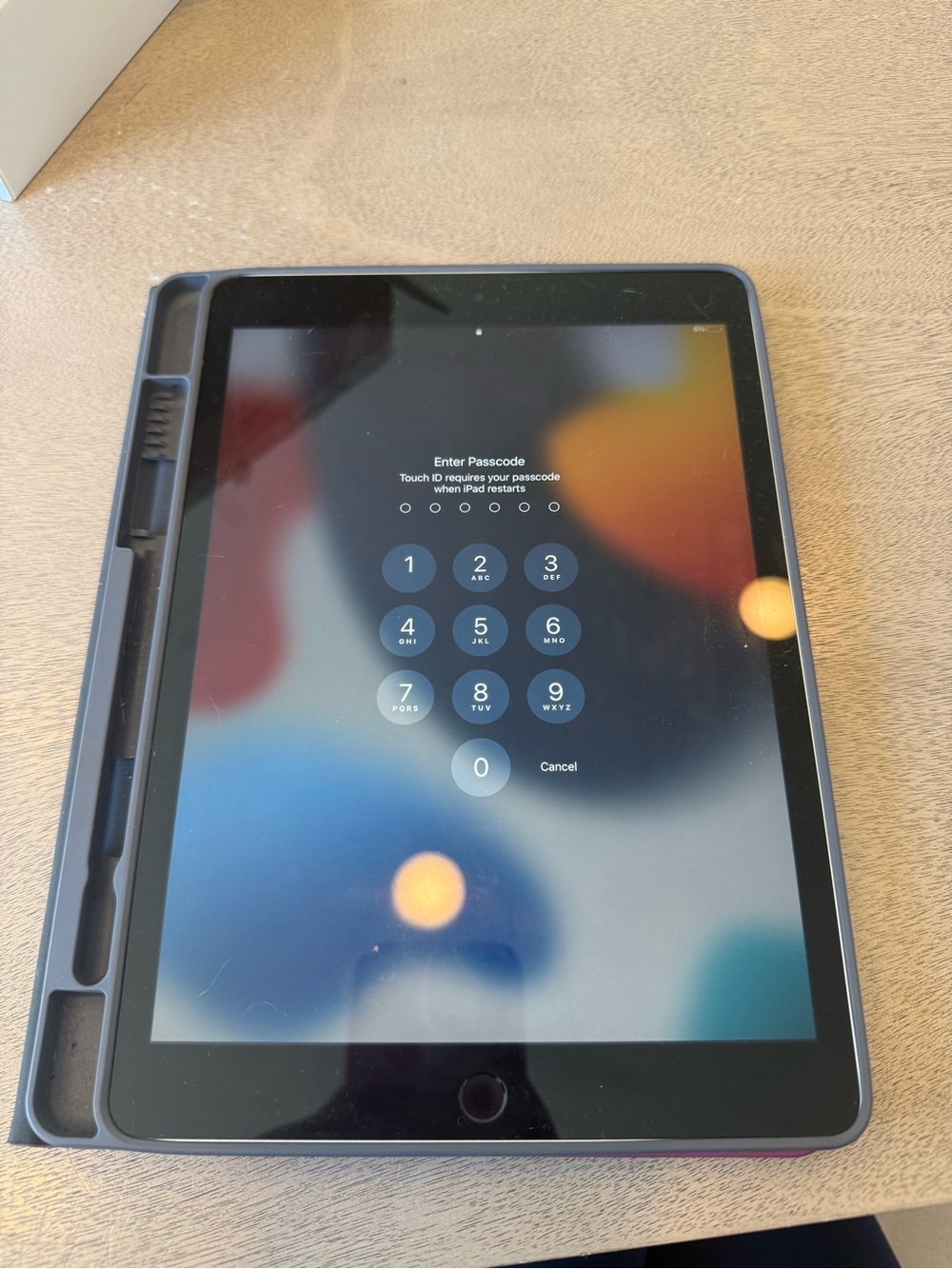 Apple iPad with Dark Gray Protective Case and Black Front